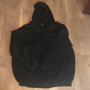 Black zip up sweater worn once fits a size m/L